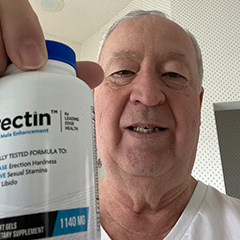 Customer Holding Erectin Bottle